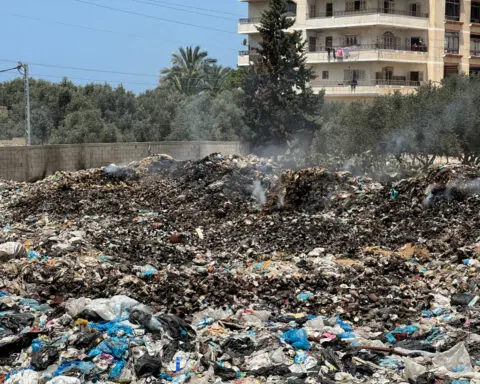 Huge mounds of rotting trash pile up around Gaza camps, UNRWA says