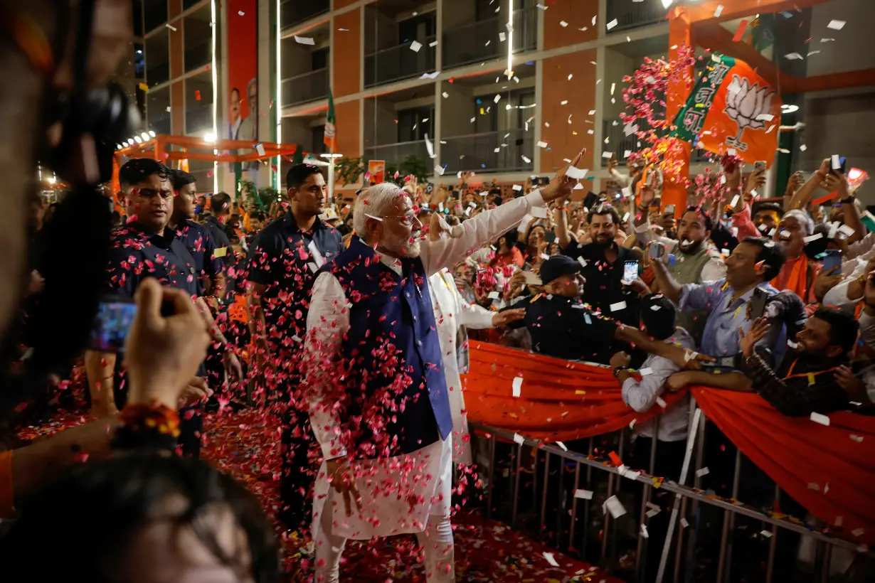 Indian PM Modi speaks to supporters at BJP headquarters, in New Delhi