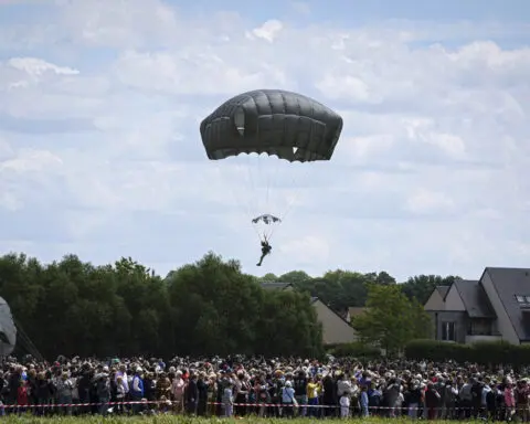 Members of Congress commemorate D-Day with their own parachute jump over Normandy