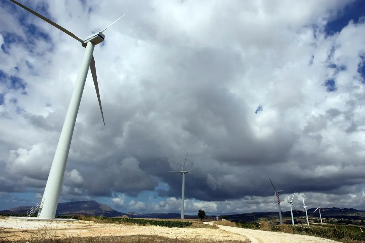 FILE PHOTO: Wind generators are seen on a farm in the countryside near the Sicilian town of Trapani