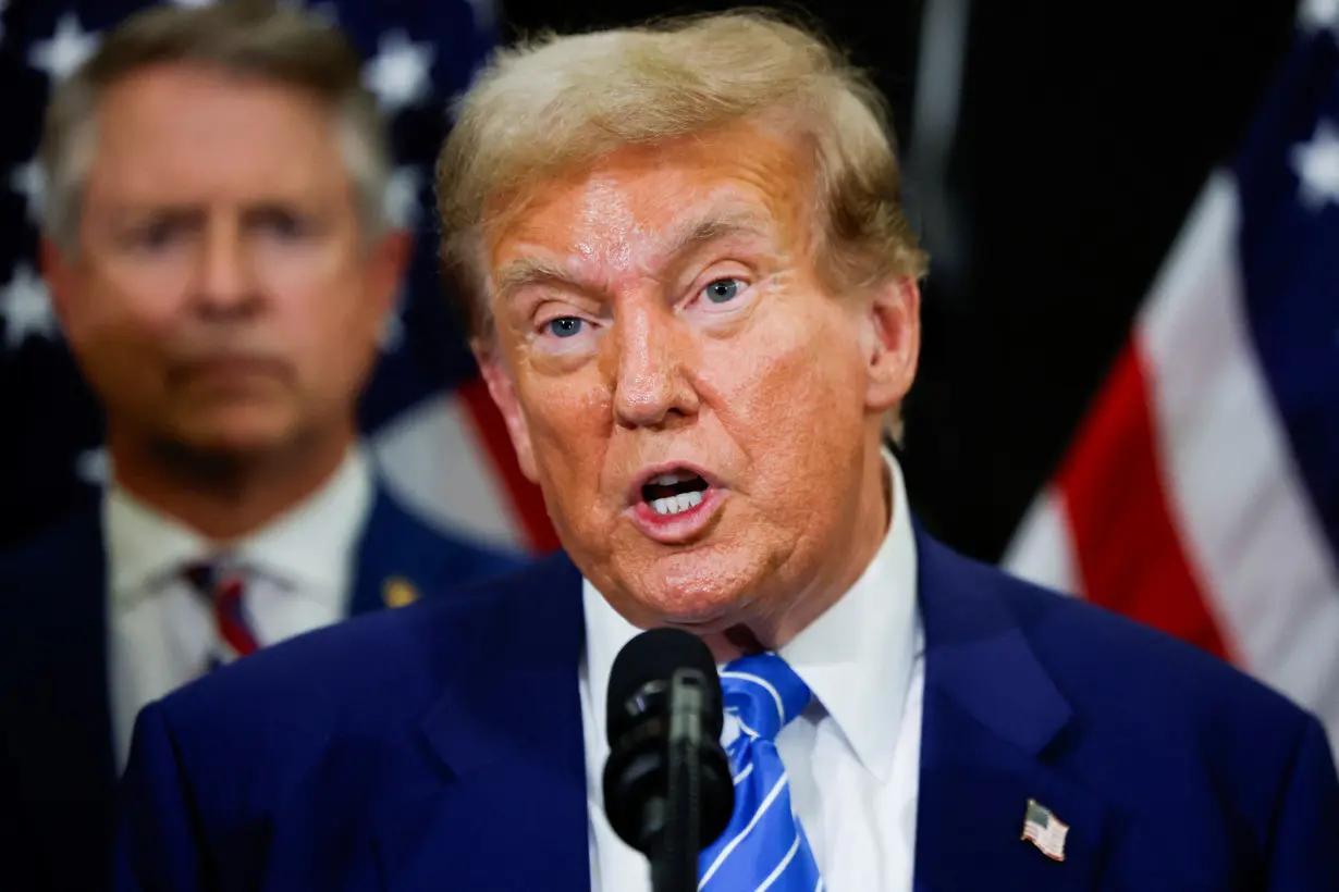 Republican presidential candidate Trump speaks to the media following meetings with Republicans on Capitol Hill, in Washington