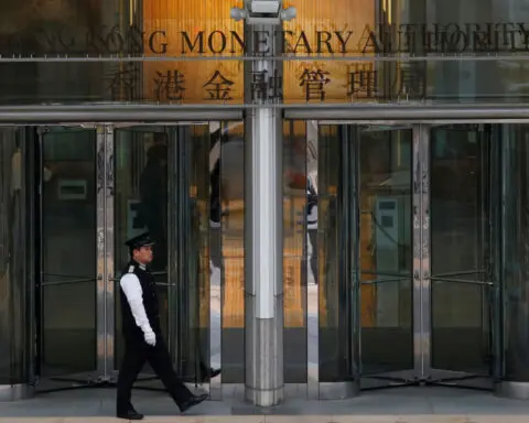 Hong Kong central bank keeps key rate steady, tracking Fed move