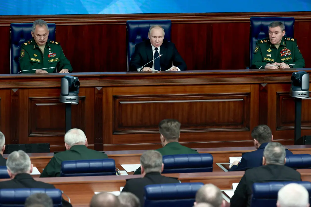 Russian President Vladimir Putin attends a meeting of Defence Ministry Board in Moscow
