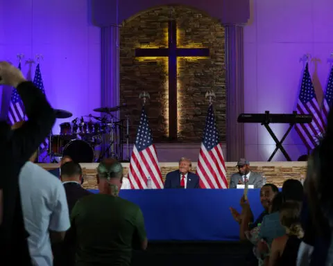 Trump visits Detroit church in bid to court Black voters