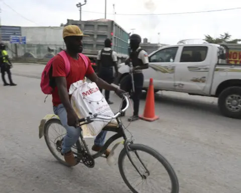 UN development specialist Garry Conille arrives to Haiti to take up the post of prime minister
