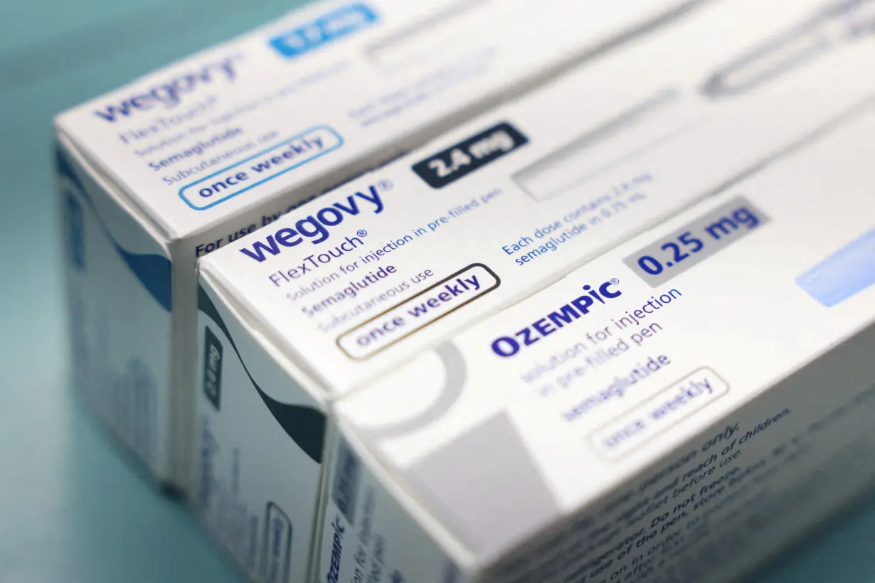 FILE PHOTO: FILE PHOTO: Boxes of Ozempic and Wegovy made by Novo Nordisk are seen at a pharmacy in London