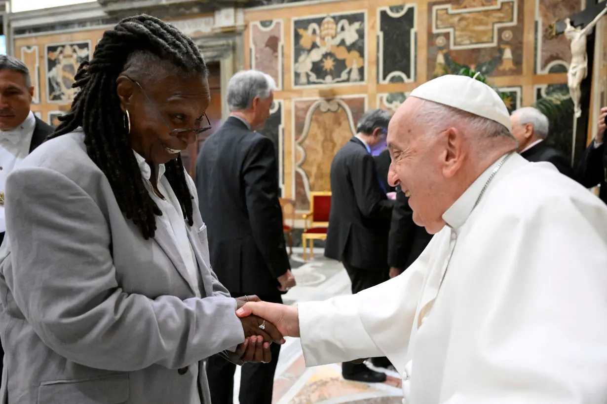 Pope Francis meets with comedians during a cultural event at the Vatican