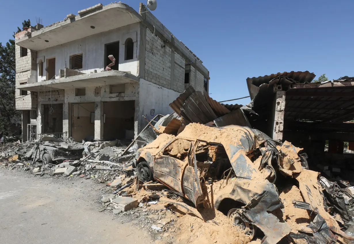 A view shows a damaged building amid ongoing cross-border hostilities between Hezbollah and Israeli forces in Houla village near the border with Israel