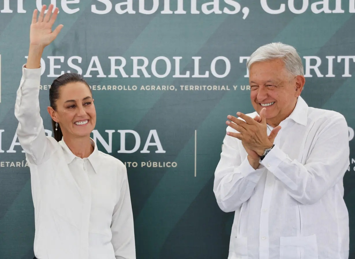 FILE PHOTO: Mexico's President Andres Manuel Lopez Obrador and President-elect Claudia Sheinbaum hold an event with relatives of Pasta de Conchos miners, in Nueva Rosita