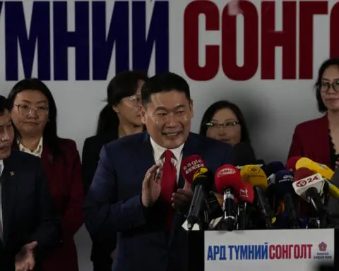 Mongolia's governing party wins only a slim majority in parliamentary election, early results show