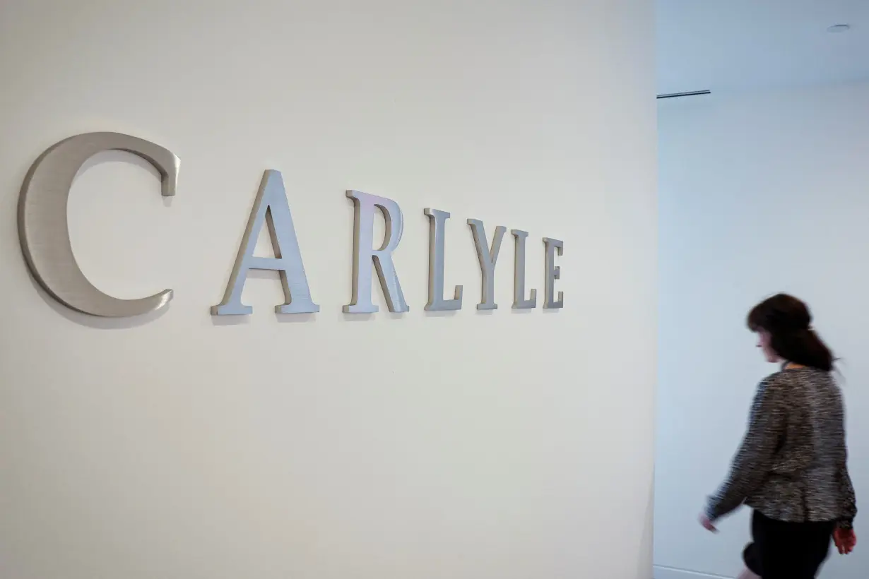 The logo for Carlyle is seen at the company’s offices in New York