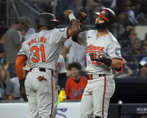 Orioles hold off Yankees 7-6 in 10 innings after Gerrit Cole makes his season debut for New York