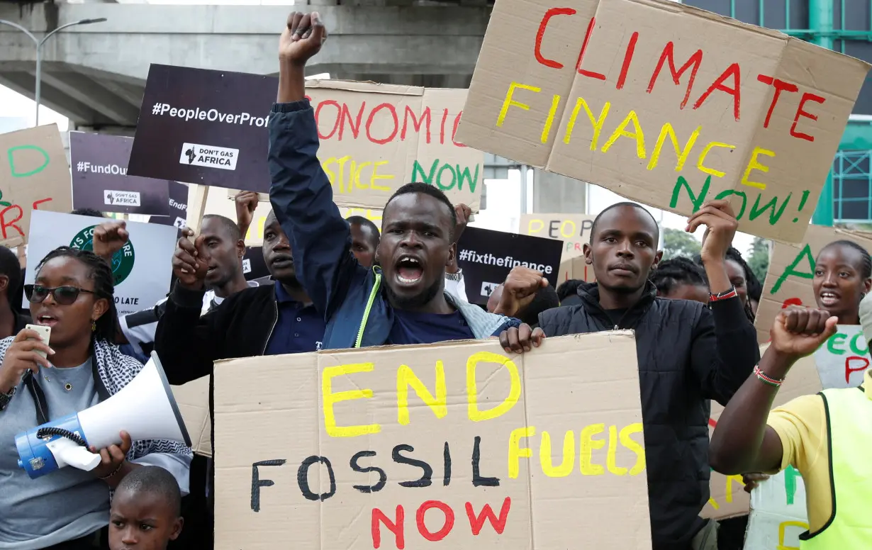 FILE PHOTO: Climate activists participate in a protest demanding economic and climate liberation in Nairobi