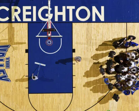 Down a step from elite college football, officials pitch a model for a new sports landscape