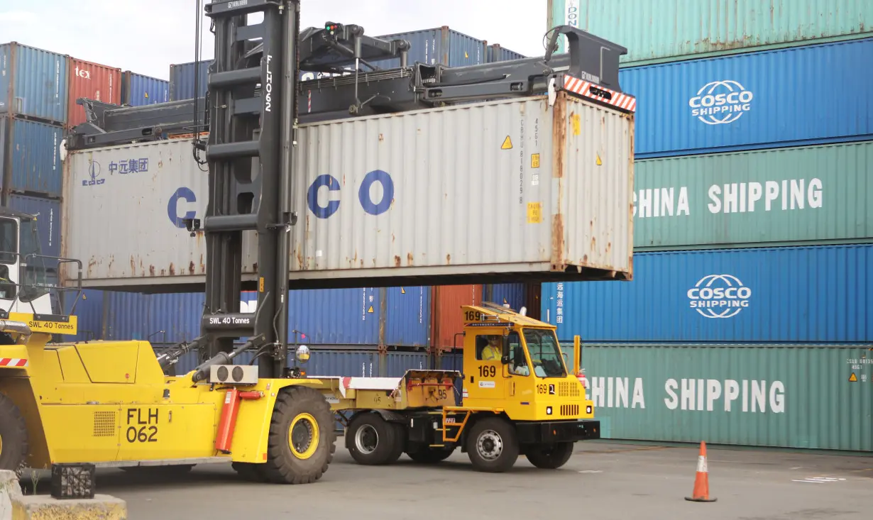 Containers are piled up at Port Botany facilities in Sydney