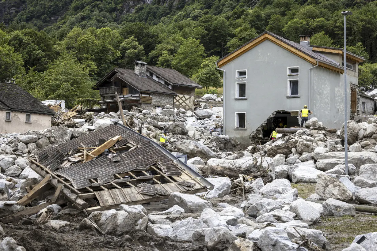 1 person found dead and 2 still missing after floods, rockslide hit a Swiss Alpine village