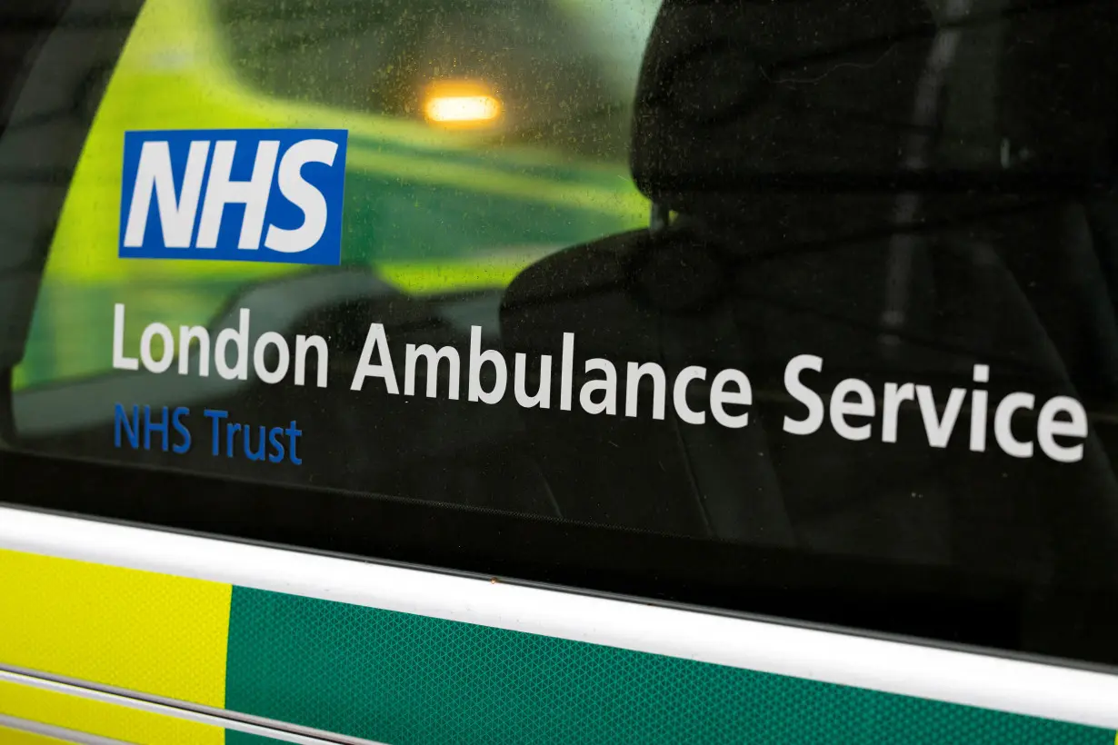 FILE PHOTO: The NHS London Ambulance Service sign is seen on an ambulance in London