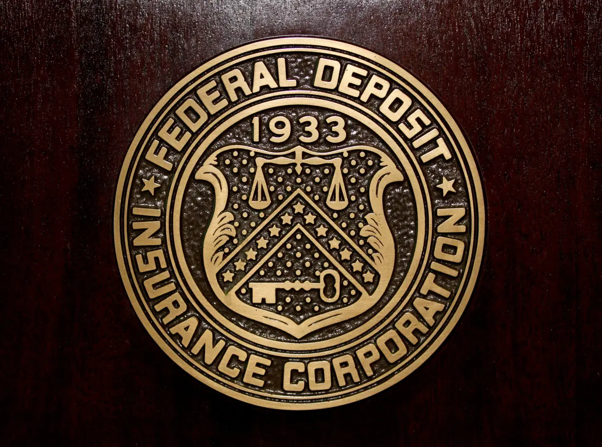 FILE PHOTO: The Federal Deposit Insurance Corp logo is seen at the FDIC headquarters in Washington