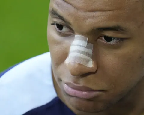 Kylian Mbappé trains at Euro 2024 with bandage on broken nose and social media post causing intrigue