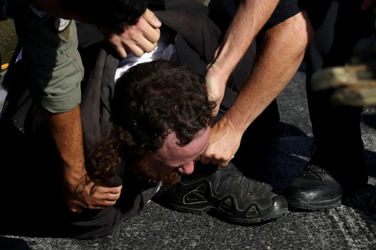 Ultra-Orthodox Jews protest against plans for conscription discussed by Israel's Supreme Court