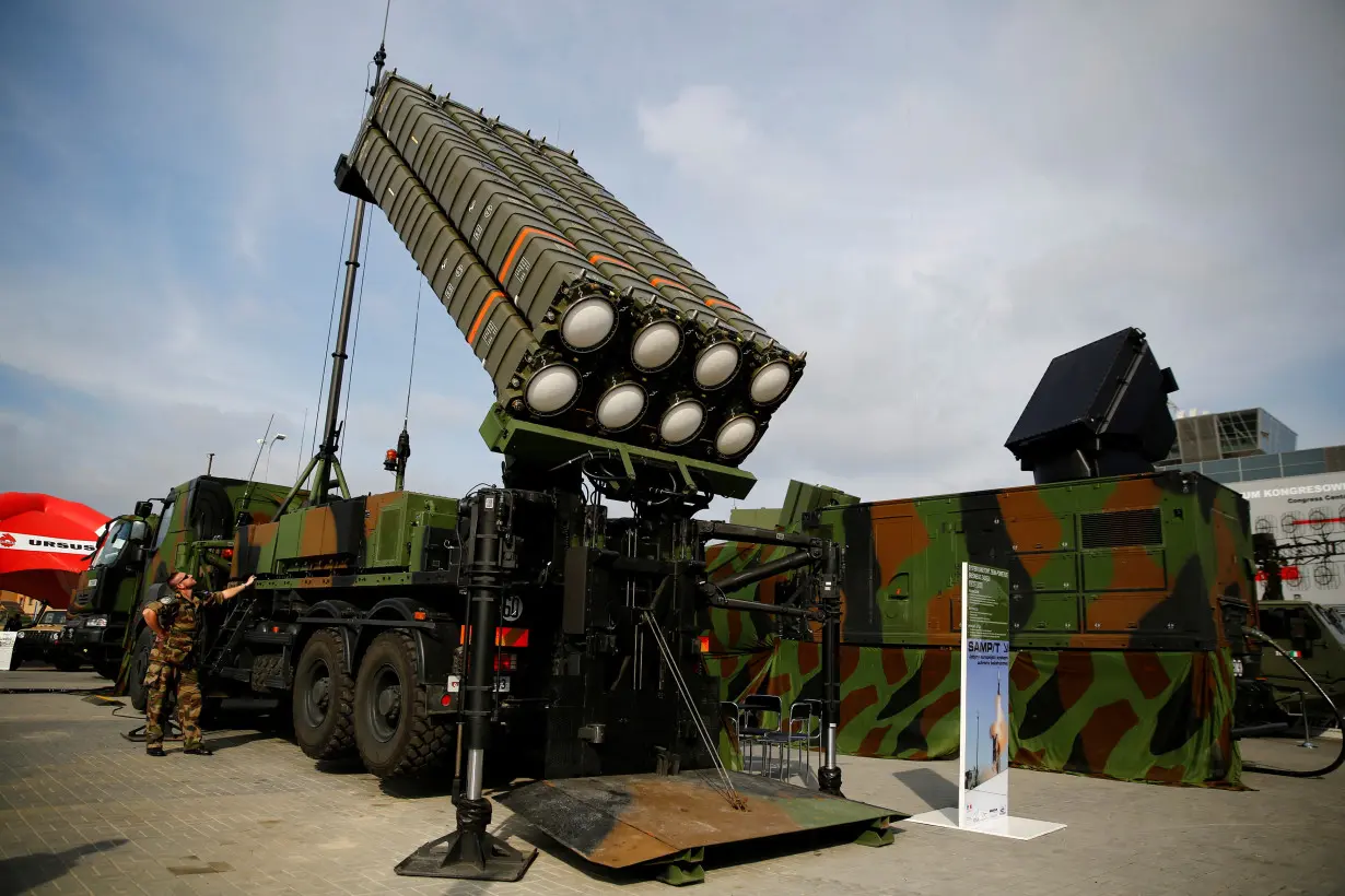 FILE PHOTO: Soldiers present an anti-missile system SAMP/T by Thales at an international military fair in Kielce