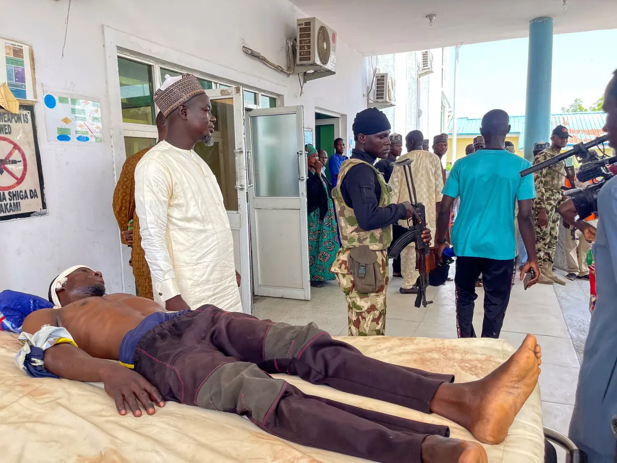 A man who was injured in a suicide bombers attack lies at a hospital in Maiduguri