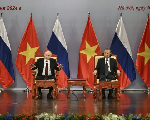 Putin signs deals with Vietnam in bid to shore up ties in Asia to offset Moscow's growing isolation