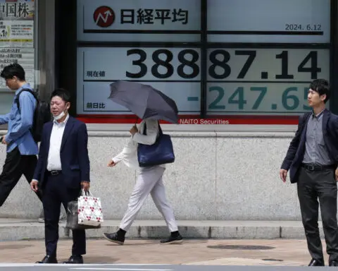 Stock market today: Asian shares are mostly lower ahead of Fed decision on interest rates