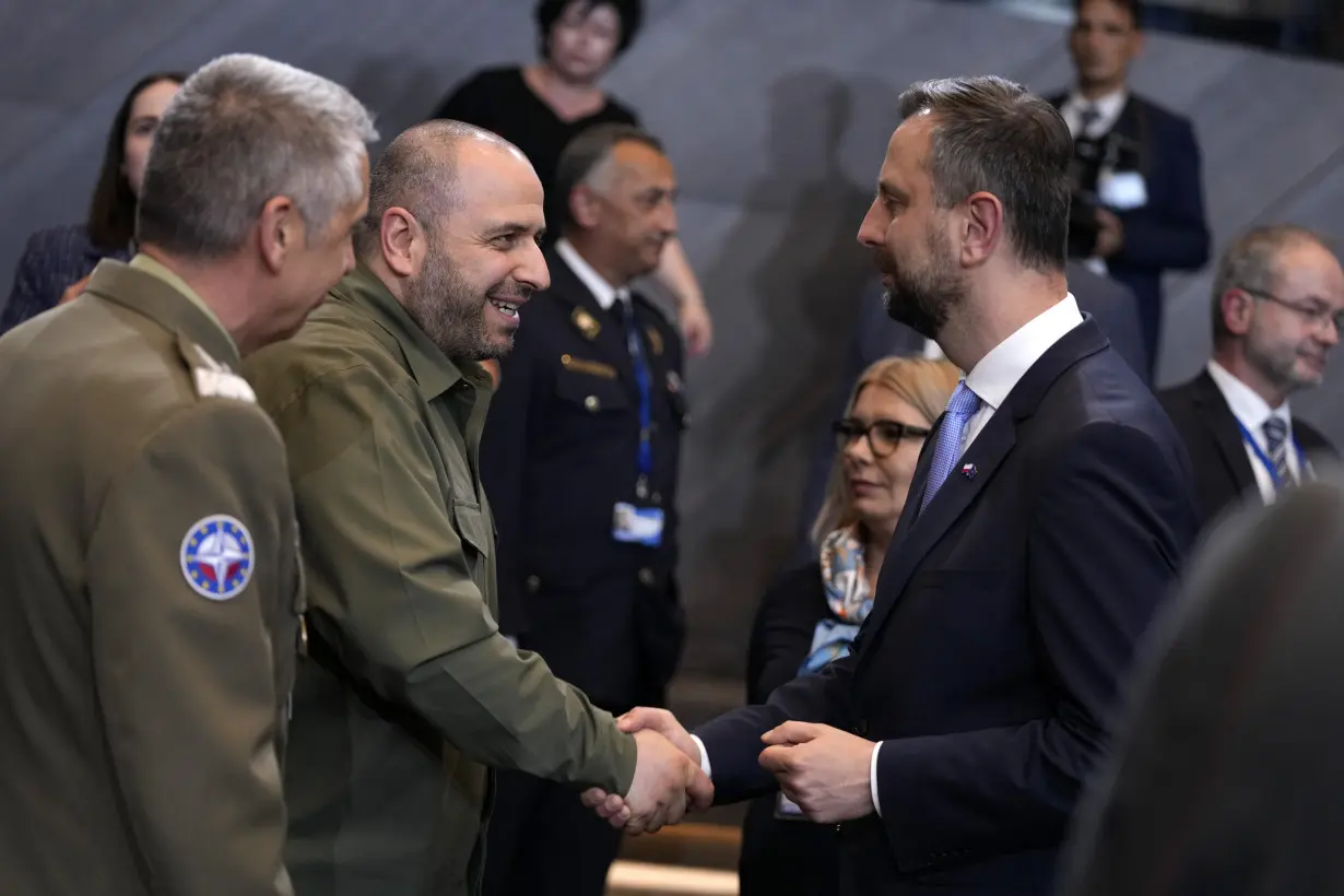 NATO approves a plan to speed security aid and training to Ukraine's beleaguered armed forces