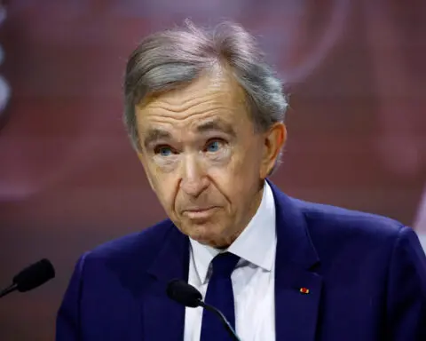 LVMH Chief Arnault owns stake in luxury rival Richemont, Bloomberg reports