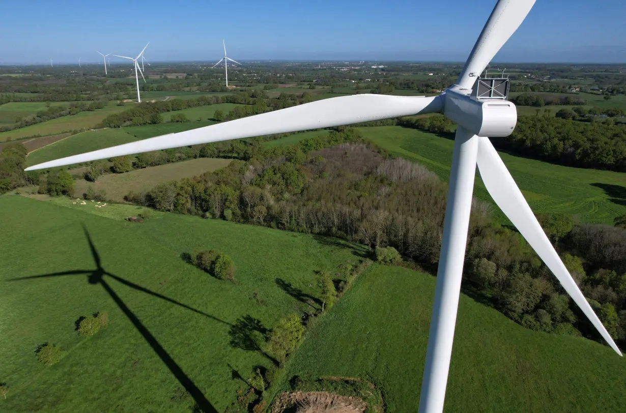 FILE PHOTO: A drone view of power-generating windmill turbines in La Regrippiere