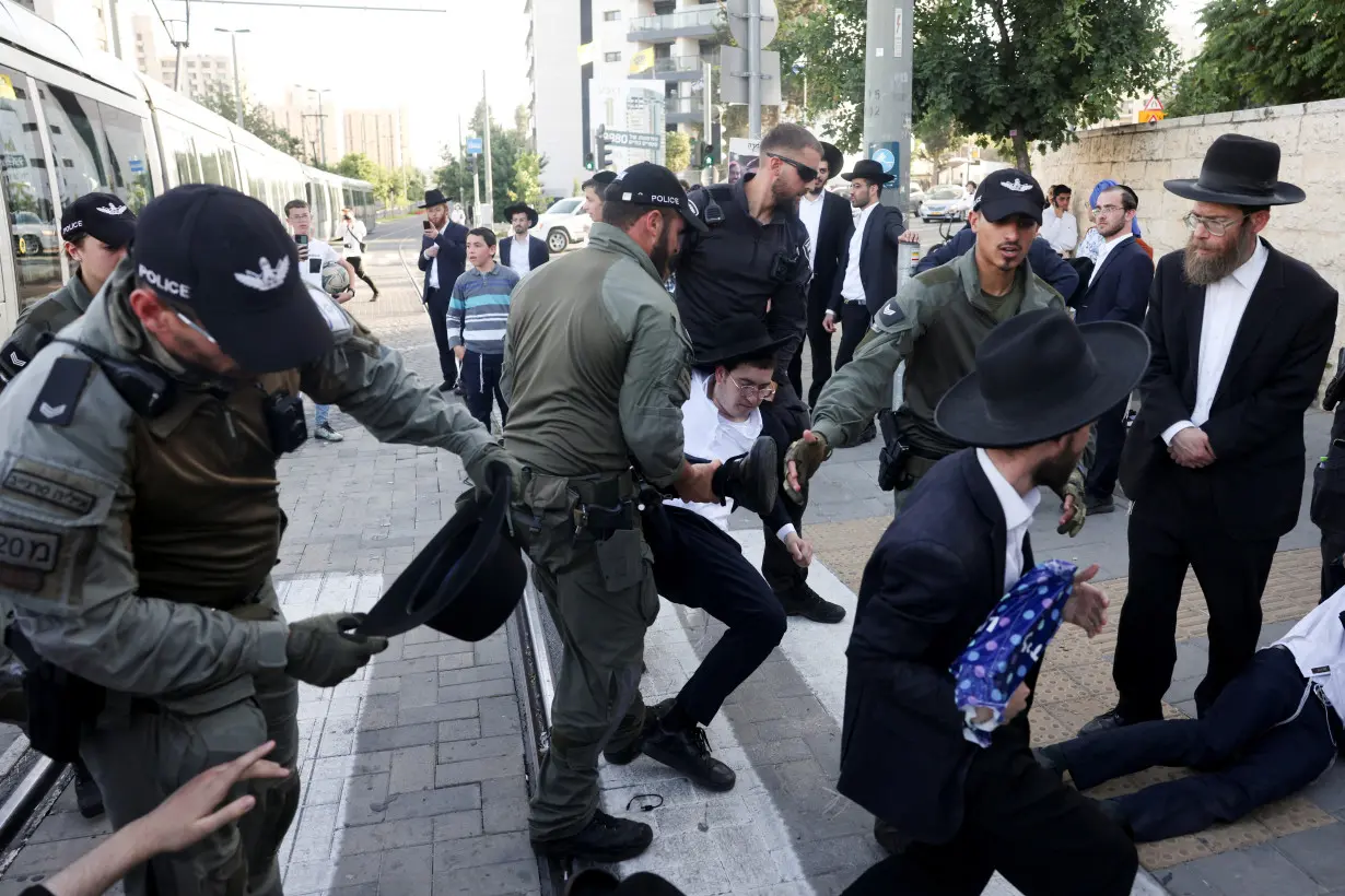 Ultra-Orthodox Jews protest against plans for conscription discussed by Israel's Supreme Court