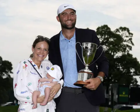 Scottie Scheffler outlasts protest on 18th green, Tom Kim to win Travelers for 6th victory of year
