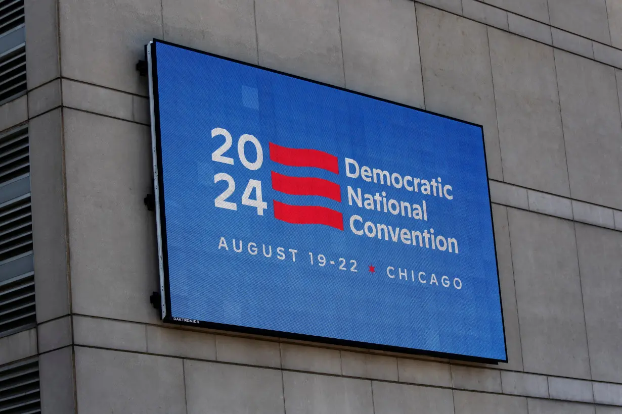 FILE PHOTO: An LED sign located on the United Center, venue for the upcoming Democratic National Convention, displays a DNC 2024 logo and information,