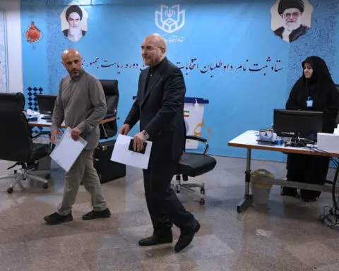 Iran's hard-line parliament speaker emerges as the theocracy's top figure in the presidential vote