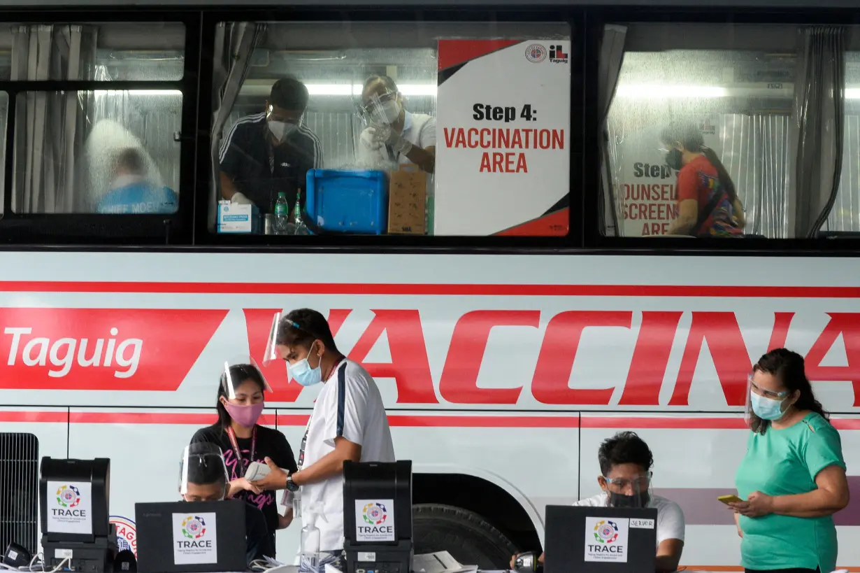 FILE PHOTO: Vaccination against coronavirus disease (COVID-19) in Taguig, Metro Manila