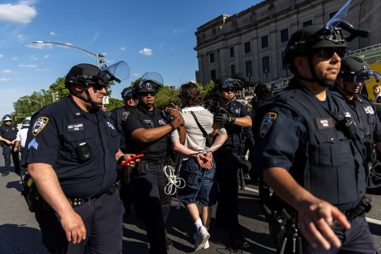 Pro-Palestinian protestors hold a rally in Brooklyn, New York