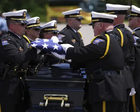 Minneapolis police officer killed while responding to a shooting call is remembered as a hero