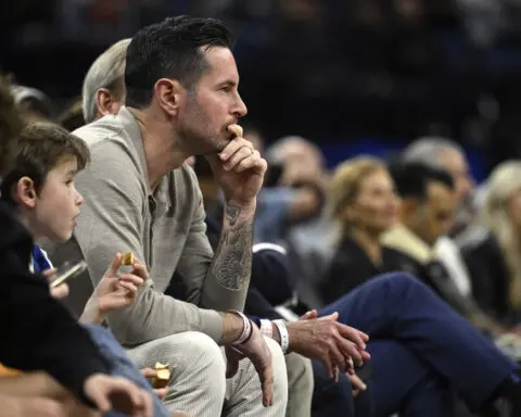 The Lakers are hiring JJ Redick as their new head coach, an AP source says