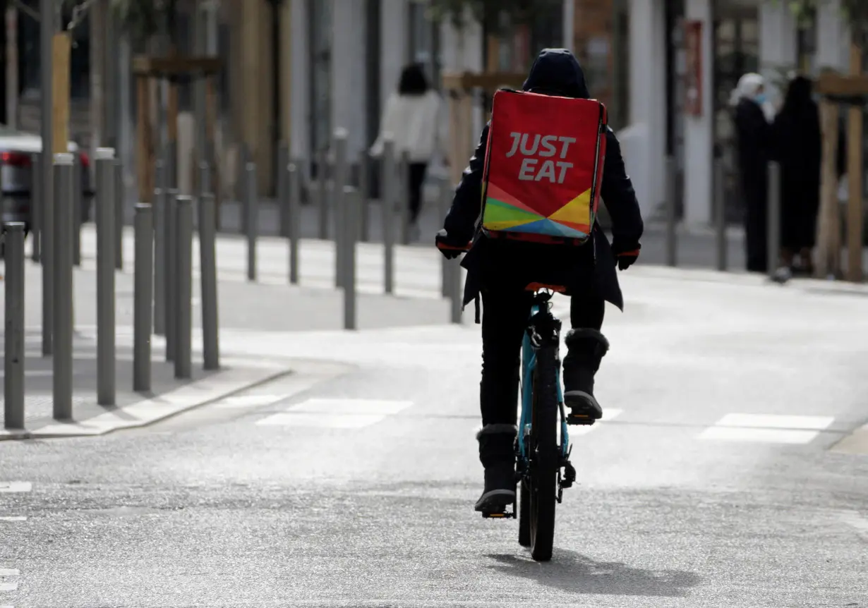 FILE PHOTO: A Just Eat delivery man in Nice, France