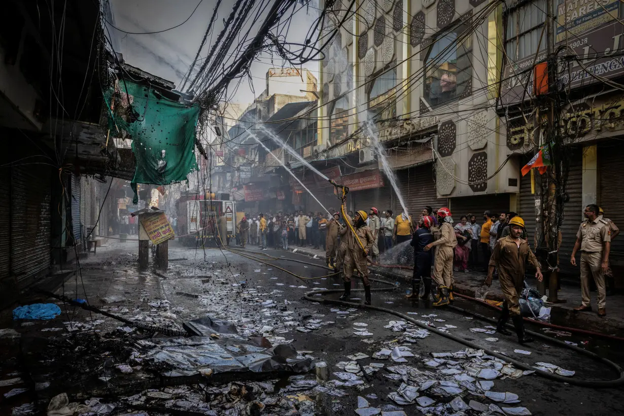 The Wider Image: Record heat, surging fires push Delhi's firefighters to the brink