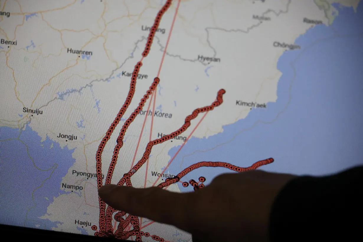 A monitor shows GPS tracking routes of balloons to distribute anti-North Korean leaflets over North Korean territory