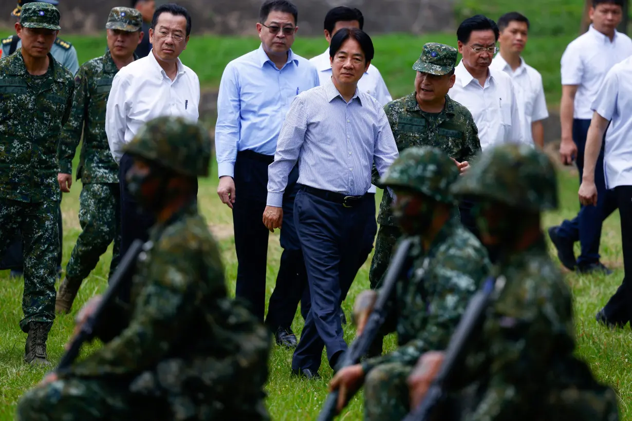 Taiwan President Lai Ching-te views training for new military recruits in Taichung