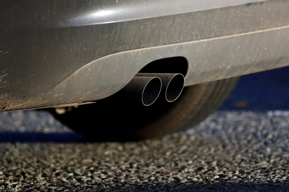 FILE PHOTO: An exhaust pipe is seen as a car sits in traffic near the Blackwall Tunnel in London
