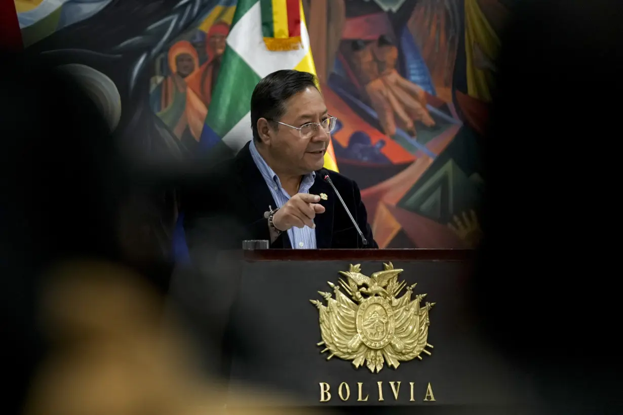 Bolivia’s president lambasts accusations of a self-coup as 'lies' as his supporters rally