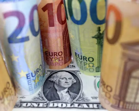 Dollar flat ahead of US jobs report, euro digests ECB cut