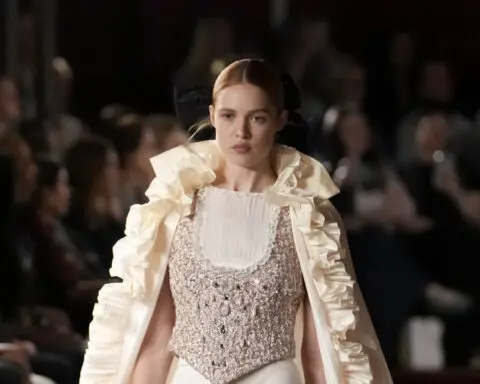 Chanel goes to the opera in a gleaming but designer-less couture collection