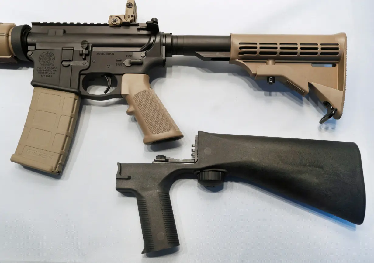 FILE PHOTO: A bump fire stock that attaches to a semi-automatic rifle to increase the firing rate is seen at Good Guys Gun Shop in Orem