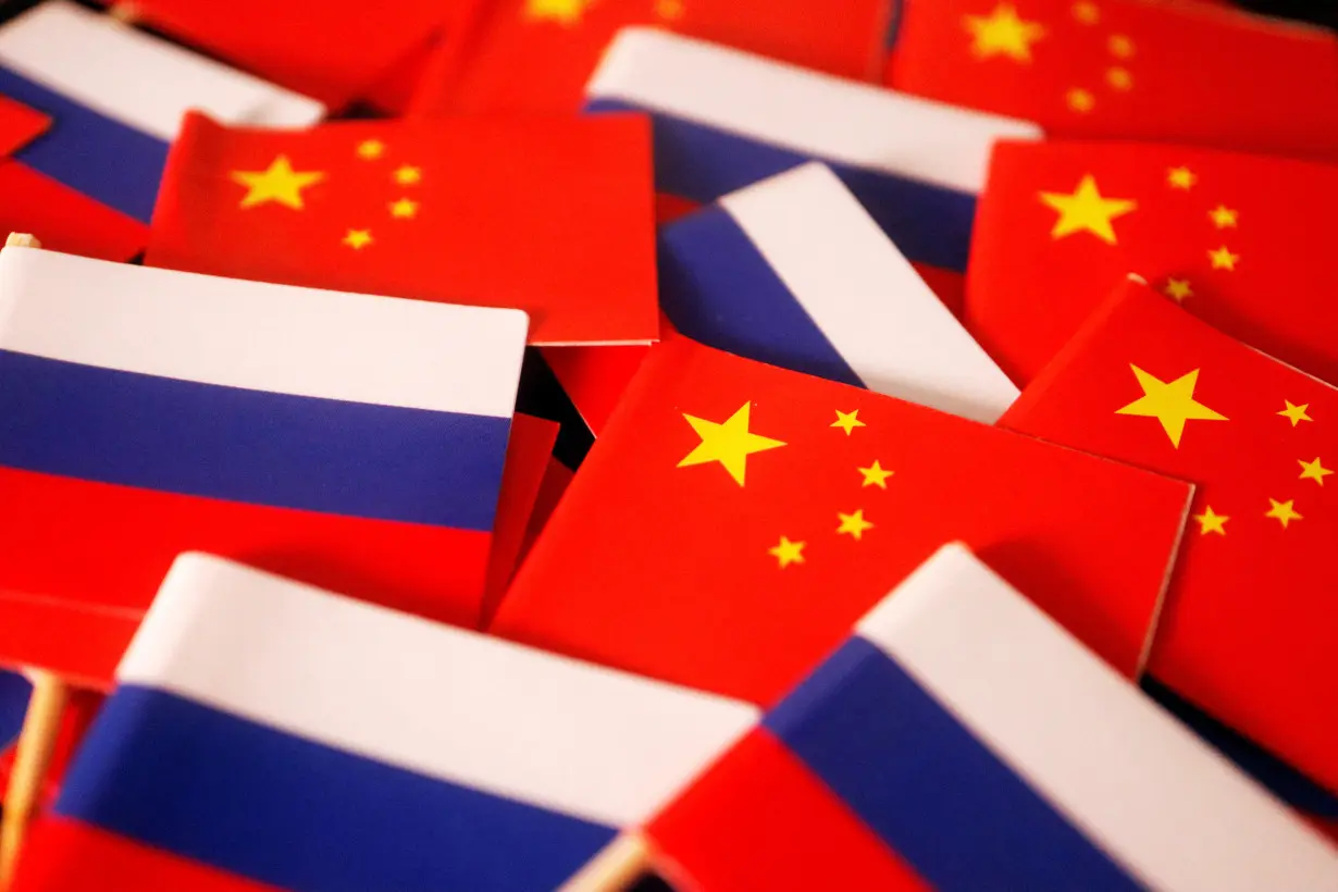 FILE PHOTO: Illustration picture of China and Russia flags