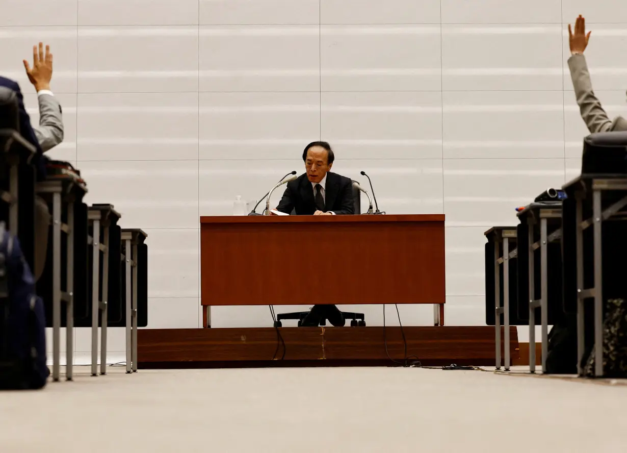 FILE PHOTO: Bank of Japan Governor Kazuo Ueda attends a press conference in Tokyo